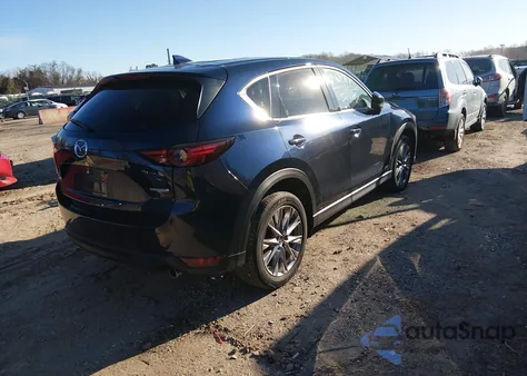 2021 Mazda Cx-5 Grand Touring z USA, uszkodzony, nr VIN JM3KFBDM4M0410667